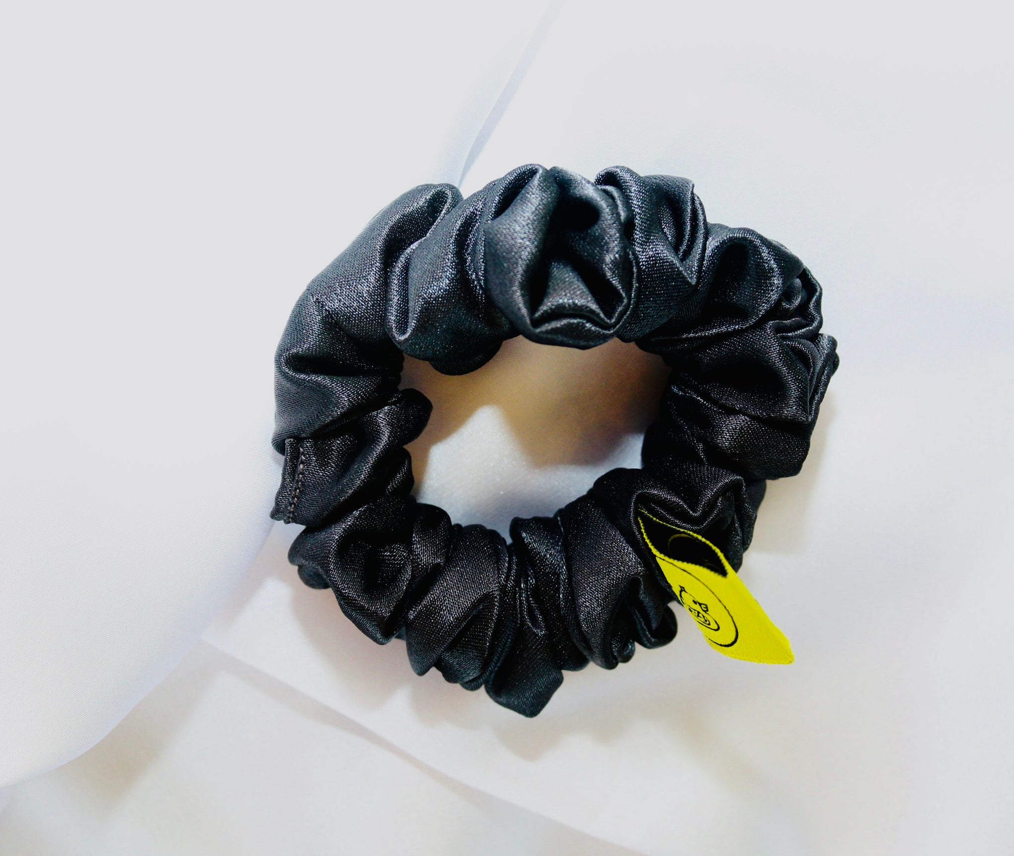 This is a luxurious slate grey satin hair scrunchie they are perfect for any elegant hairstyle,they will hold your hair in place without pulling on your roots preventing hair loss.Making them perfect for anyone who has a sensitive scalp or chronic illness.