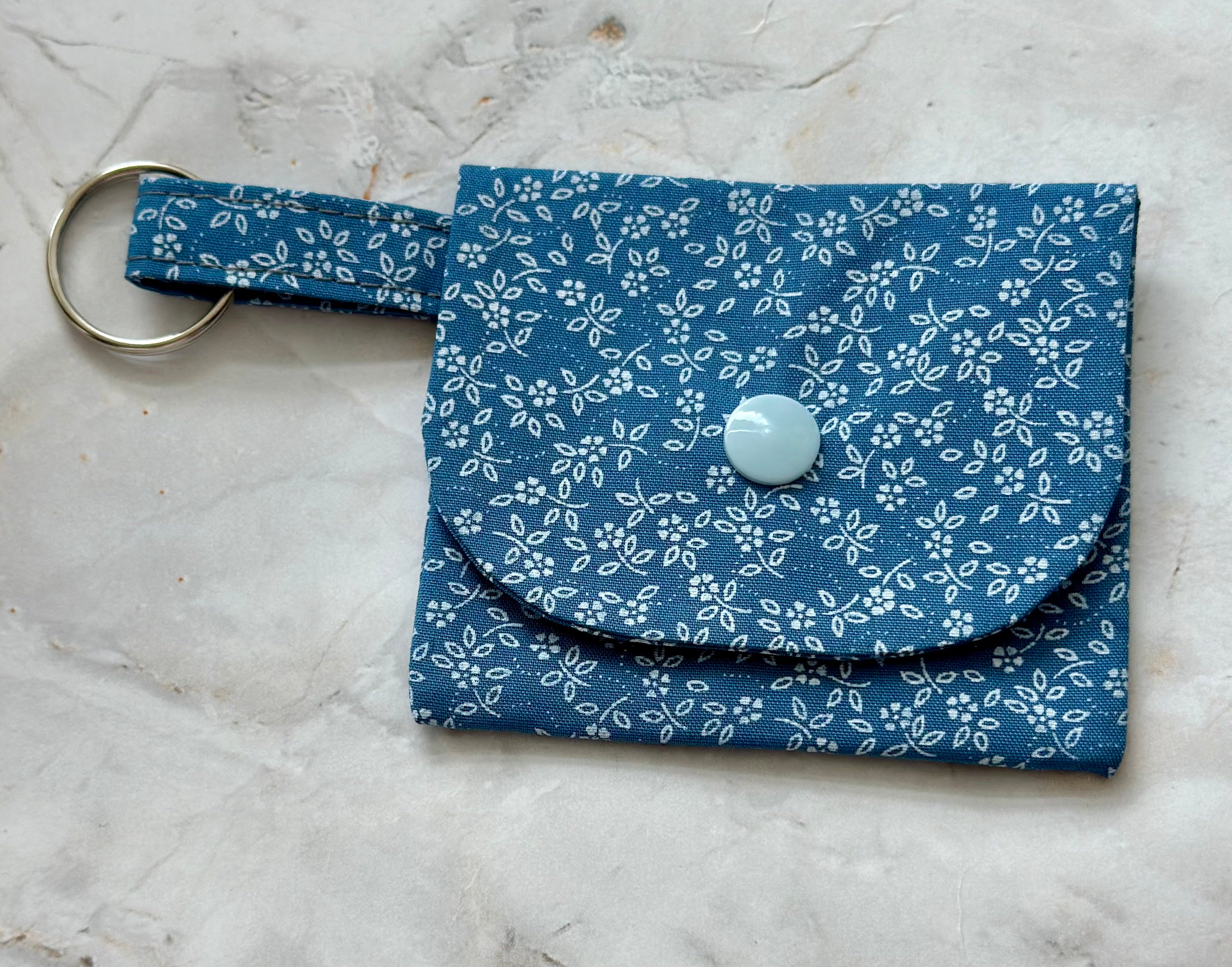 Pale blue and white floral coin purse