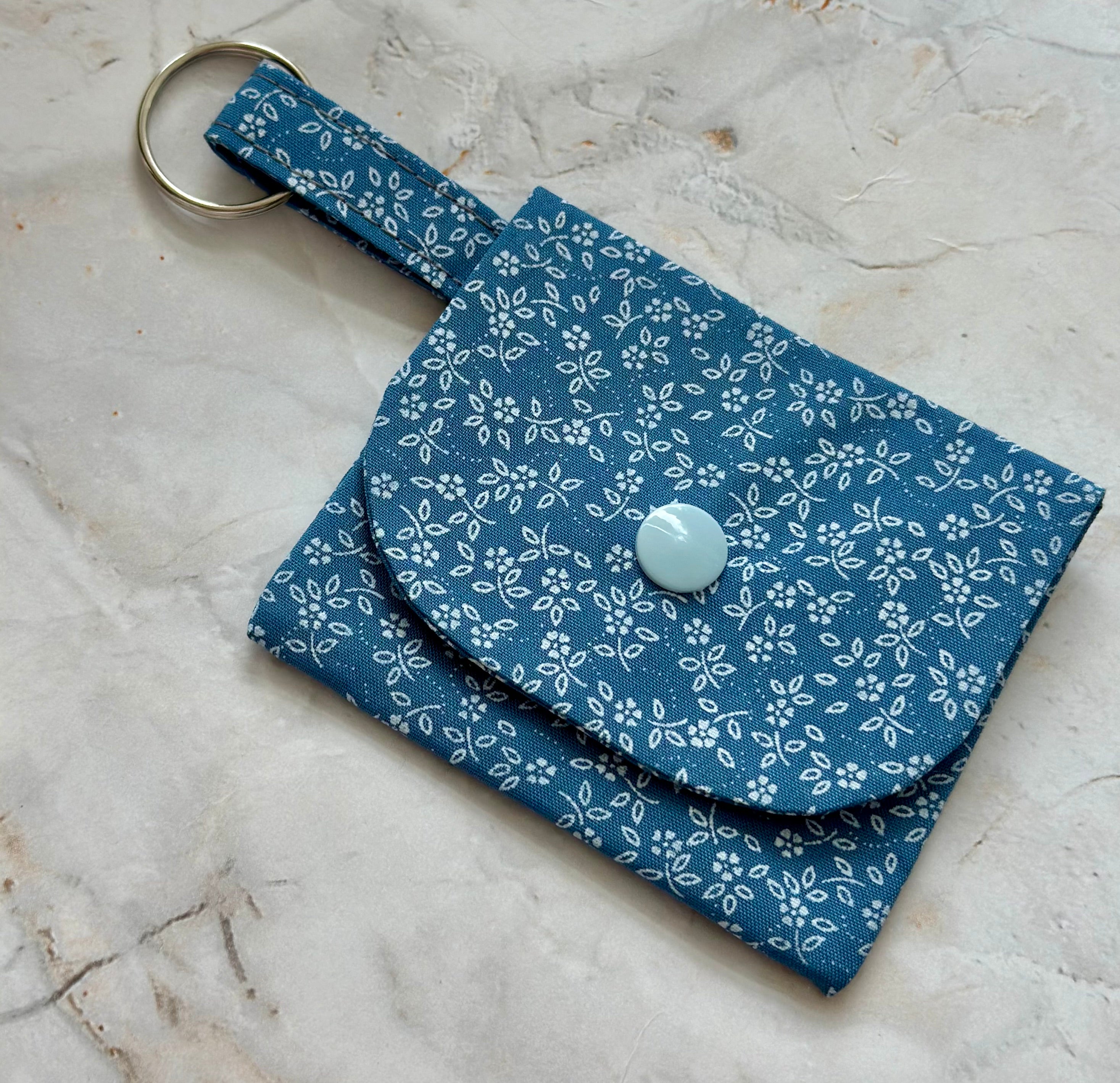 Pale blue and white floral coin purse